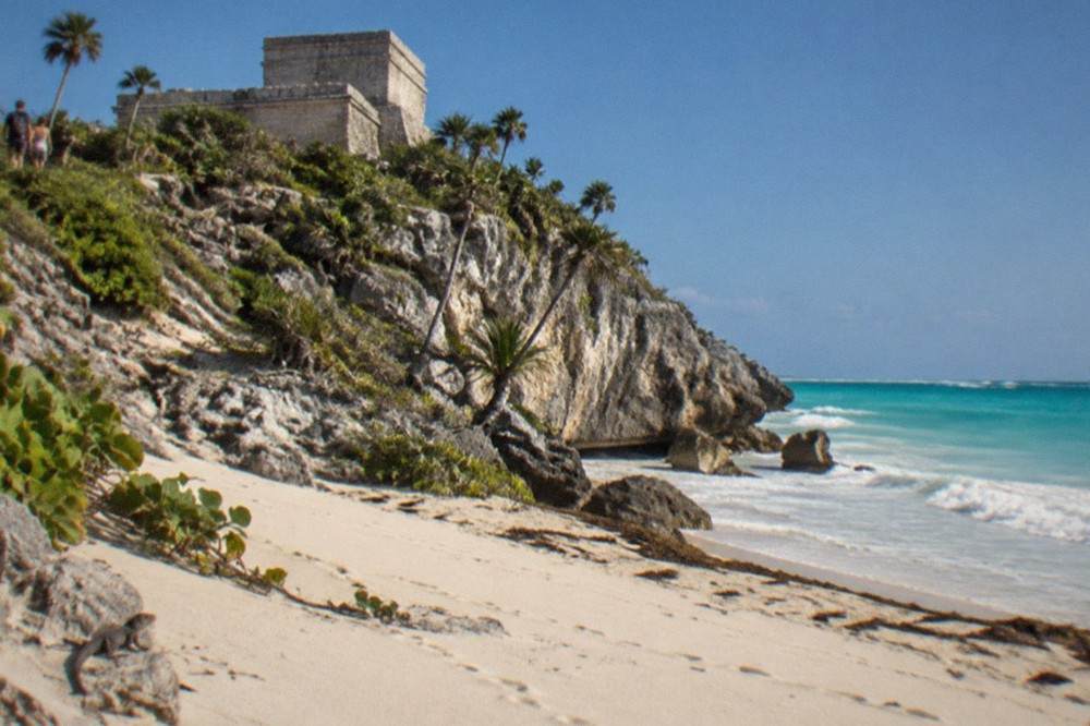 El Castillo temple pyramid overlooking the Caribbean from a limestone cliff