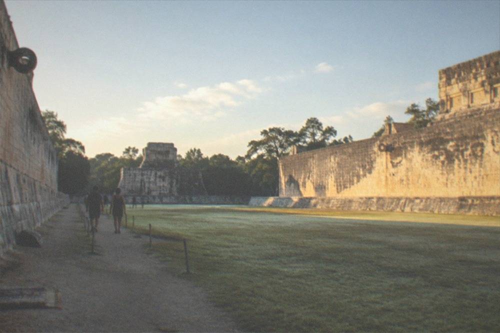 Morning light over the open plaza beside the great ballcourt walls