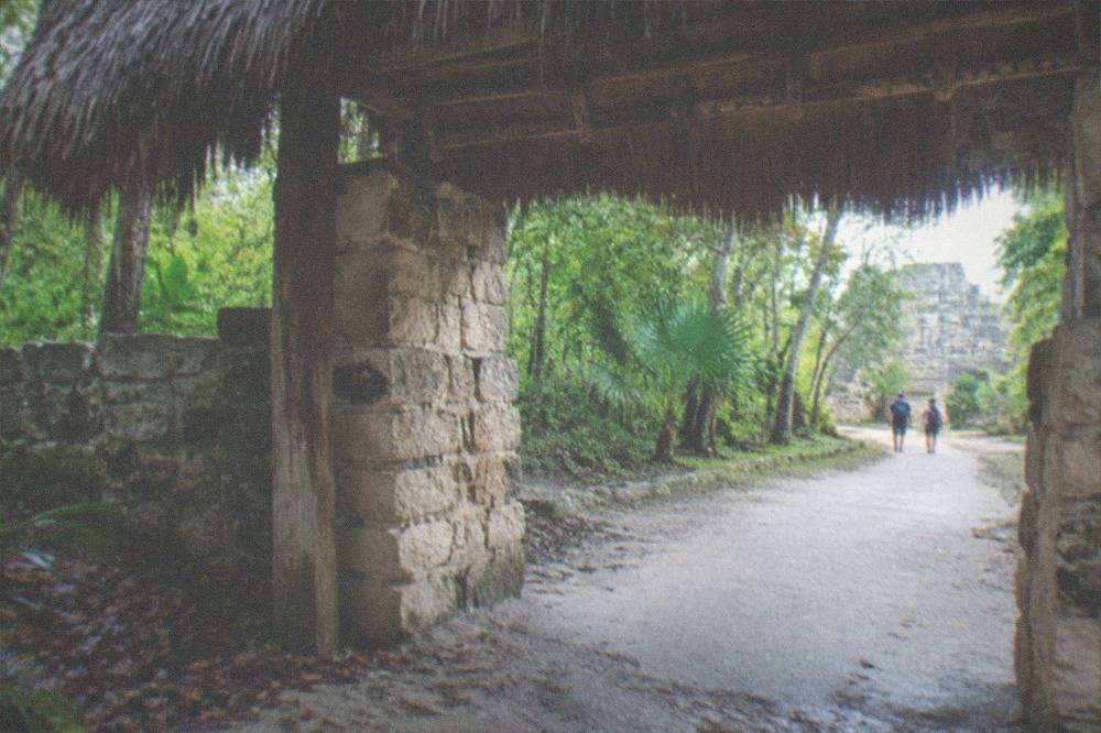 The entrance gateway and dirt path leading into the Ek Balam archaeological site