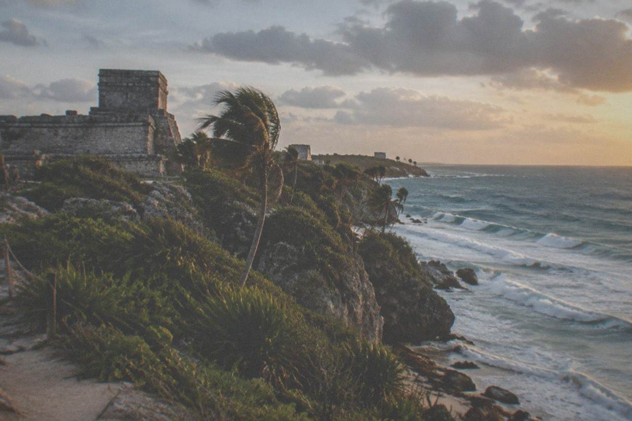 Walled Maya ruins on a cliff above the Caribbean Sea at Tulum