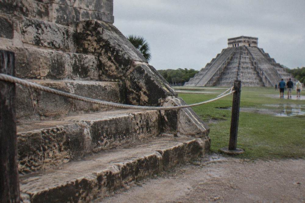 Rope barrier marking the closed perimeter around a stepped Maya pyramid