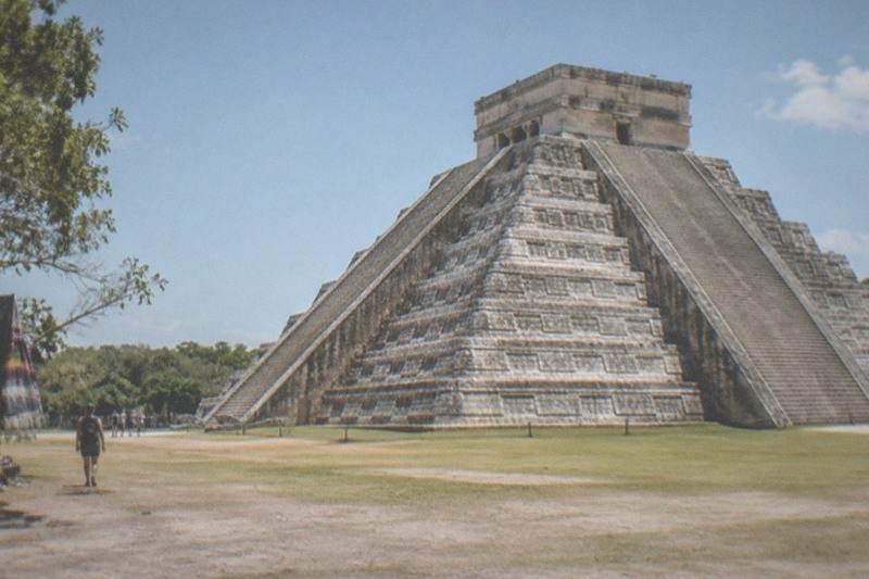 Chichen Itza's stepped pyramid under open sky on a day trip from Tulum