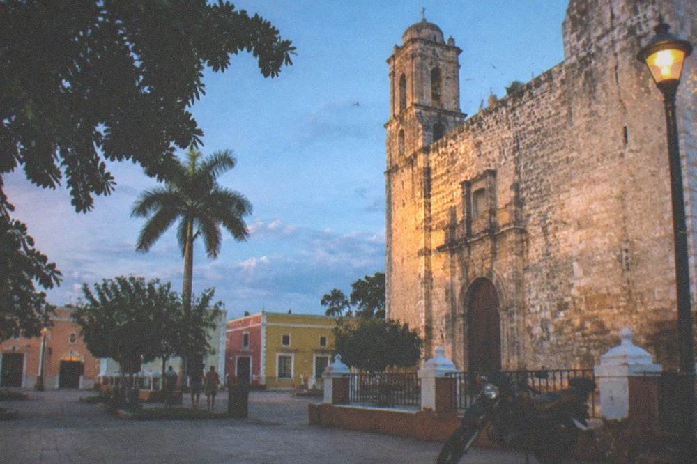 Colonial church and colorful street facades in the center of Valladolid